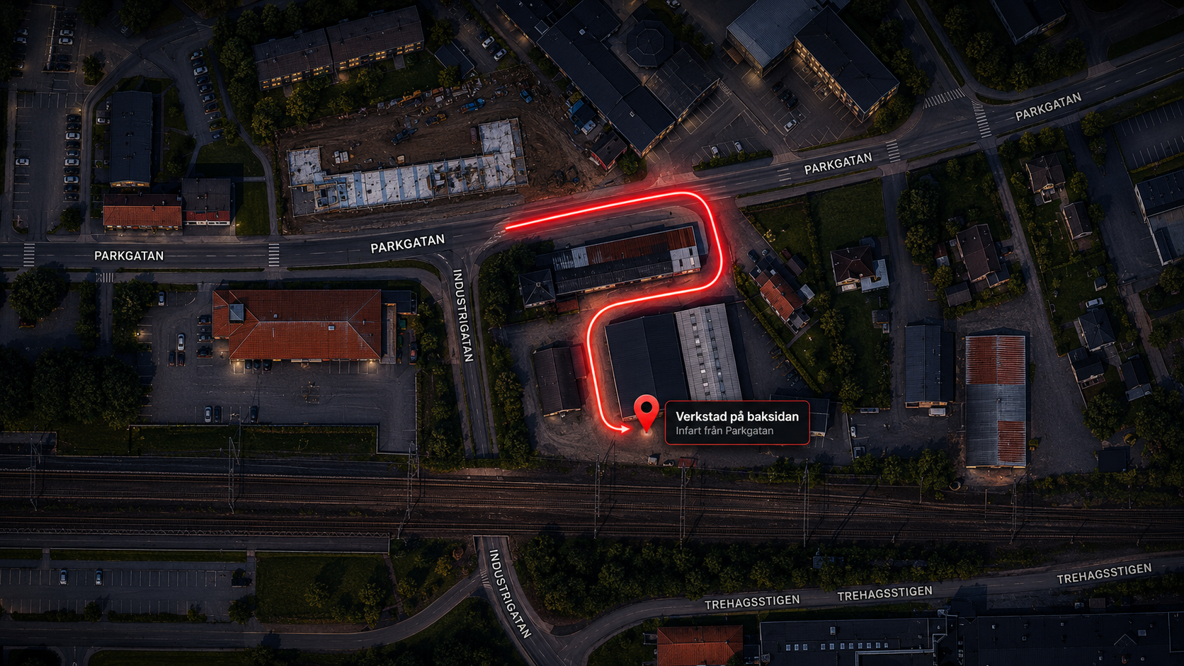 Illustration som visar hur du kör från Parkgatan runt byggnaden till verkstaden på Industrigatan 3